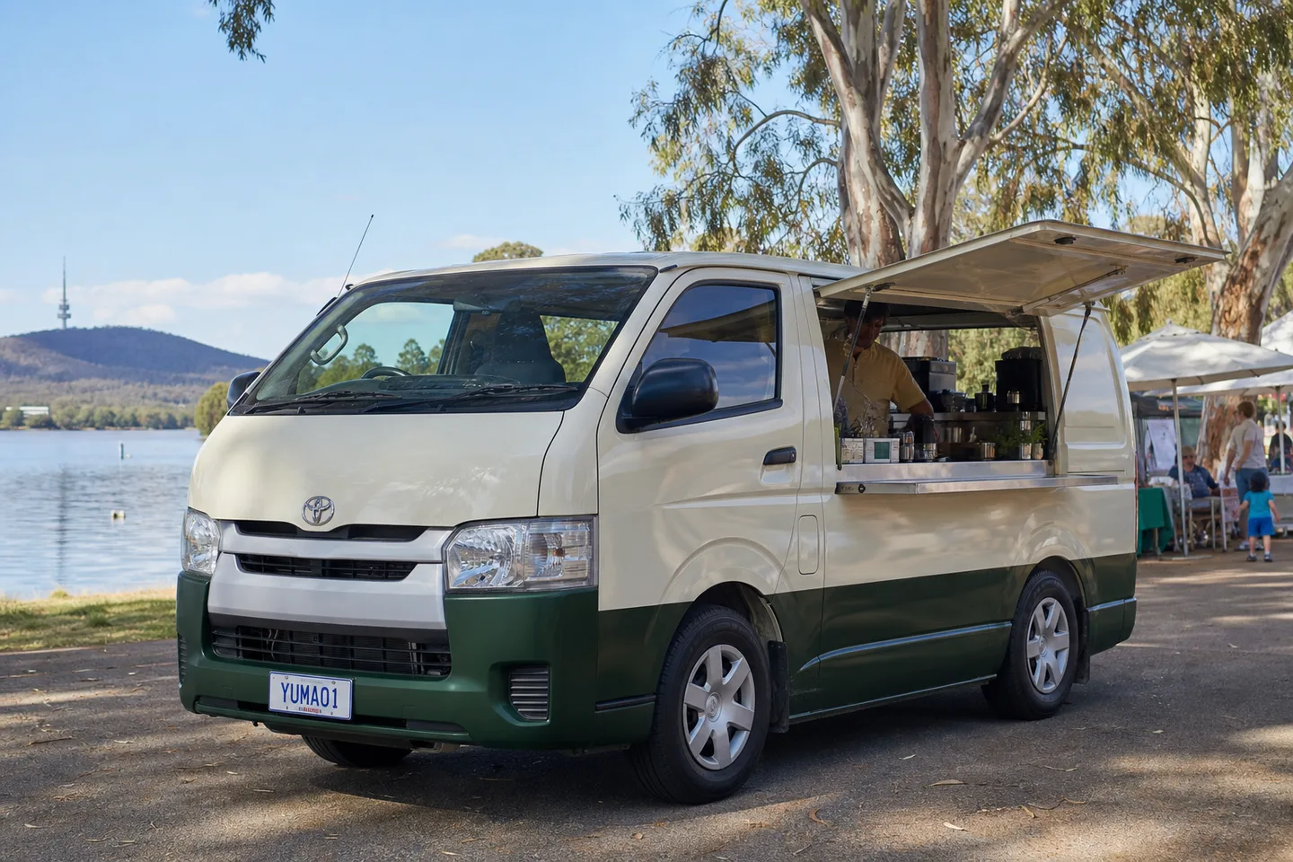 Yuma Book brand artwork of a coffee van beside Lake Burley Griffin